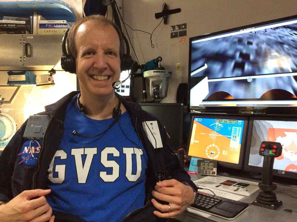 Tim Evans in GVSU shirt at NASA